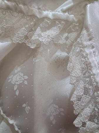 It's a bit of a tradition to wear a hand-me-down dress, I'm around the same size as one of the older nuns who wore this dress. I'm showing the material up close as I'd rather not show a full image so I can always say this is definately not me IRL... honest