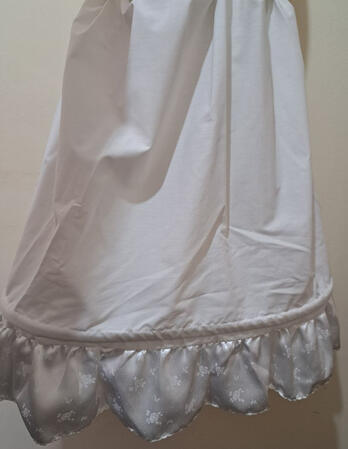 The underskirt is very tight and it has a very narrow ring? The bottom dress bone? I feel it is fine to show as I'm not wearing it in the photo.